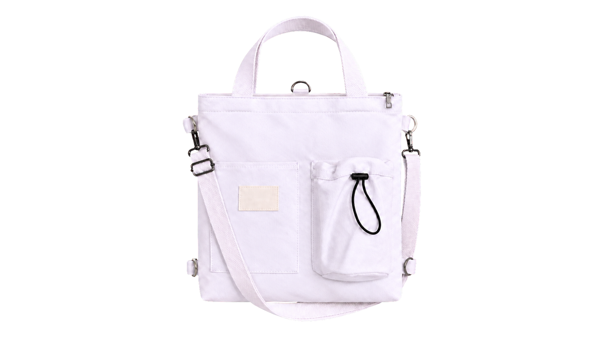 Totebee convertible canvas tote, white, on a marigold background