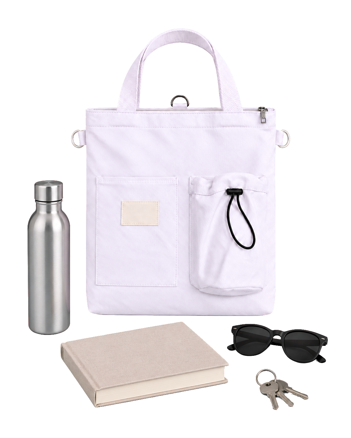 The white tote standing upright with an insulated bottle, a hardback book, sunglasses and a set of keys laid out beside it